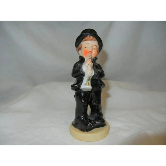 Vintage Figurine of man/boy in tunexdo and top hat playing the clarinet, Japan - Picture 1 of 5